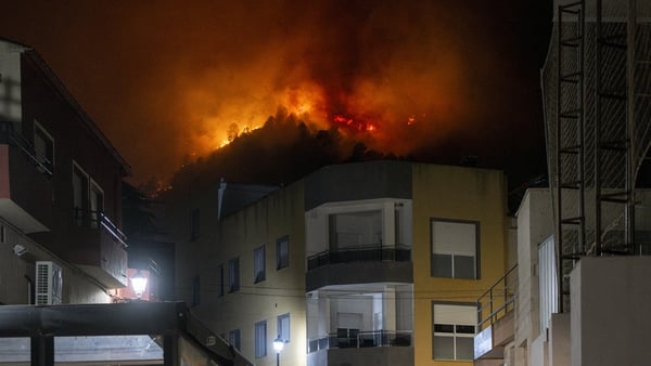 About 200 firefighters backed by three water bombing planes are battling the blaze