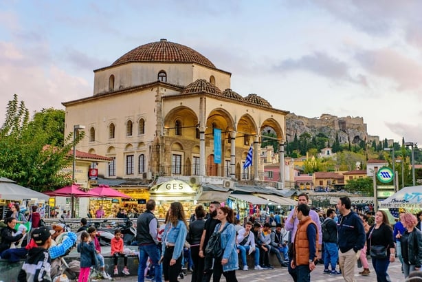 People at the square in front of Monastiraki Station in Athens, Greece