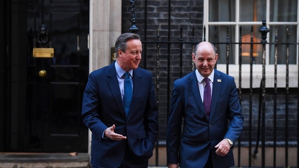 David Cameron, British Foreign Secretary (L) and Philip Barton, permanent undersecretary of the UK Foreign Office