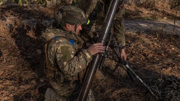 Ukrainian soldiers pictured near the banks of the Dnipro river earlier this month