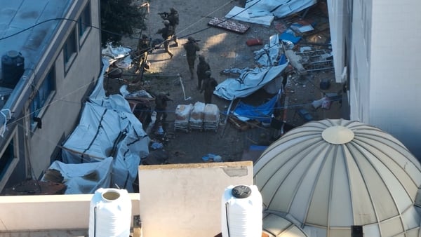 Israeli soldiers walk through the Al Shifa hospital complex (Pic: IDF via Reuters)