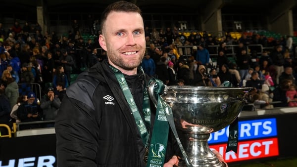 Athlone Town manager Ciaran Kilduff celebrates with the FAI Cup