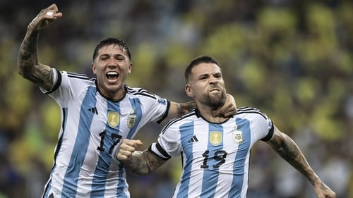 Nicolas Otamendi (R) celebrates his goal with Enzo Fernandez